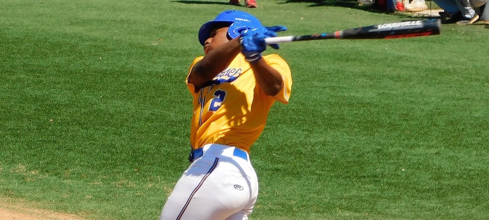 Taylor Lomack scored the winning run in both games on Saturday (photo courtesy of Karen Baumholtz)