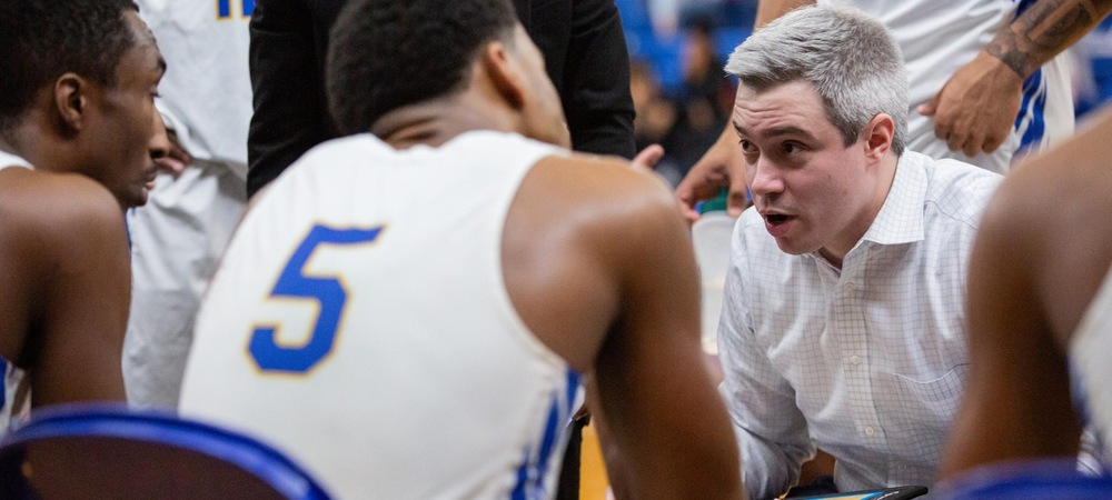 Head coach Zach Settembre gives instructions to his team (photo courtesy of Michael Schwarz)