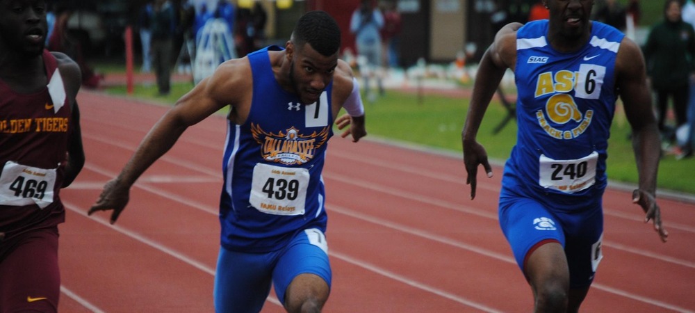 Jovanny Valdez crosses the finish line in the men's 100m final at the FAMU Relays